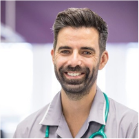 A headshot photograph of Filipe Carvalho smiling. 
