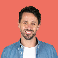 A headshot photograph of Russ smiling. 